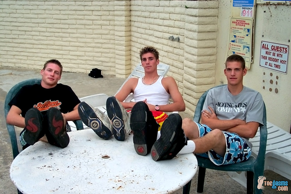 Twinks hanging out showing off their sneaker soles