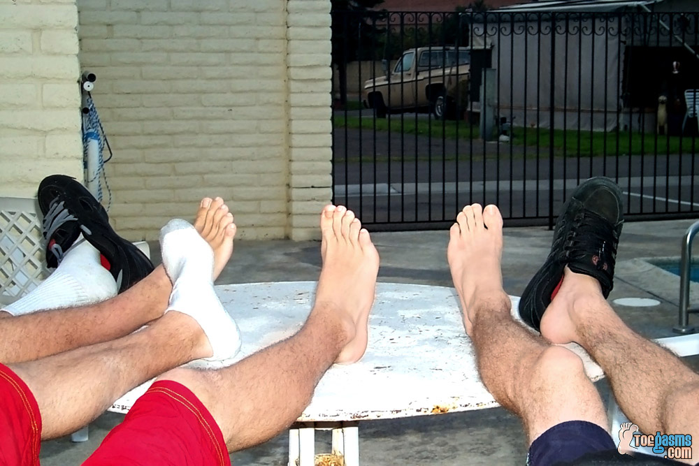 Cute guys showing their bare feet
