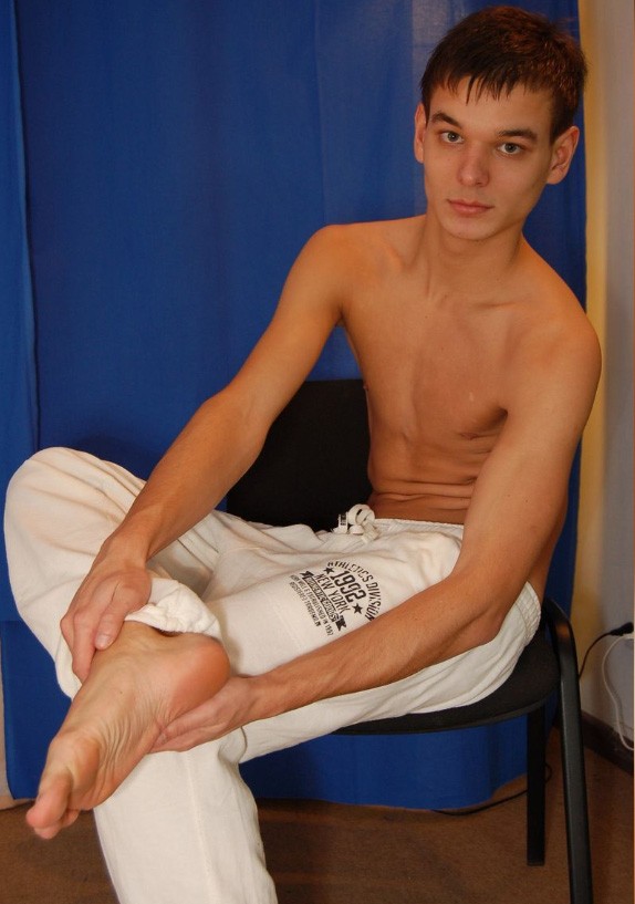 cute and slim twink shows bare feet